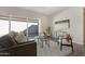 Living room with sliding glass doors opening to a patio at 4072 E Las Colinas Dr, Chandler, AZ 85249