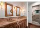 Bathroom with double vanity and a large walk in shower at 40980 N 97Th St, Scottsdale, AZ 85262