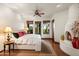Bright bedroom with fireplace, mountain views, and ceiling fan at 40980 N 97Th St, Scottsdale, AZ 85262