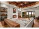 Living room boasts a fireplace, large windows with scenic views, and comfortable seating at 40980 N 97Th St, Scottsdale, AZ 85262