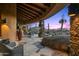 Covered patio with stunning sunset views and mountain backdrop at 40980 N 97Th St, Scottsdale, AZ 85262