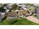 House with brown roof, green lawn, and swimming pool visible from above at 4124 N 64Th N St, Scottsdale, AZ 85251