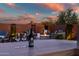 Wine and glasses on the outdoor bar overlooking the firepit at 41240 N Shadow Creek Ct, Anthem, AZ 85086