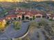 Luxury estate home with expansive grounds and circular driveway at 42638 N Chiricahua Pass, Scottsdale, AZ 85262