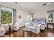 Spacious main bedroom with sitting area and hardwood floors at 42638 N Chiricahua Pass, Scottsdale, AZ 85262