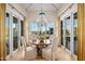 Bright breakfast nook with a wooden table and views of the backyard at 42638 N Chiricahua Pass, Scottsdale, AZ 85262