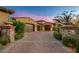 Brick driveway leading to a two-car garage at 42638 N Chiricahua Pass, Scottsdale, AZ 85262