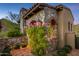 Stone exterior with brick pathway and flowers at 42638 N Chiricahua Pass, Scottsdale, AZ 85262
