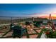Landscaped backyard with fire pit, seating area, and mountain views at 42638 N Chiricahua Pass, Scottsdale, AZ 85262