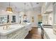Spacious kitchen island with farmhouse sink and breakfast bar at 42638 N Chiricahua Pass, Scottsdale, AZ 85262