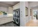 Laundry room with washer, dryer, and ample counter space at 42638 N Chiricahua Pass, Scottsdale, AZ 85262