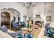 Spacious living room with fireplace and large windows at 42638 N Chiricahua Pass, Scottsdale, AZ 85262