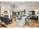 Living room with wet bar and access to backyard at 42638 N Chiricahua Pass, Scottsdale, AZ 85262