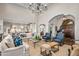 Open living room with access to kitchen and entryway at 42638 N Chiricahua Pass, Scottsdale, AZ 85262