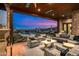 Relaxing outdoor patio with seating area and pool view at 42638 N Chiricahua Pass, Scottsdale, AZ 85262