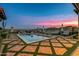 Luxury pool and spa with brick patio and stunning sunset views at 42638 N Chiricahua Pass, Scottsdale, AZ 85262