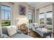 Relaxing sitting area with fireplace and access to pool at 42638 N Chiricahua Pass, Scottsdale, AZ 85262