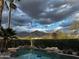 Peaceful pool area with mountain views at 4427 S Priceless View Dr, Gold Canyon, AZ 85118