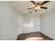 Spacious bedroom with wood floors and double doors at 4692 E Jadeite Dr, San Tan Valley, AZ 85143