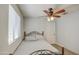 Cozy bedroom with ceiling fan and window at 4692 E Jadeite Dr, San Tan Valley, AZ 85143