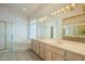 Bathroom features a large vanity, soaking tub, and shower at 6334 E Viewmont Dr # 9, Mesa, AZ 85215