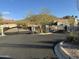 Gated community entrance with landscaped entryway and mountain views at 6334 E Viewmont Dr # 9, Mesa, AZ 85215