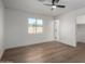 Light and airy bedroom with wood floors and closet at 6712 E Pershing Ave, Scottsdale, AZ 85254