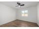 Spacious bedroom with wood floors and a window at 6712 E Pershing Ave, Scottsdale, AZ 85254