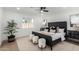 Spacious bedroom with a king-size bed and access to the backyard at 6712 E Pershing Ave, Scottsdale, AZ 85254