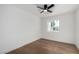 Sunny bedroom with wood floors and ceiling fan at 6712 E Pershing Ave, Scottsdale, AZ 85254