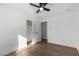 Bedroom with wood floors and ceiling fan at 6712 E Pershing Ave, Scottsdale, AZ 85254