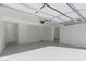 Bright garage with epoxy flooring and extra storage at 6712 E Pershing Ave, Scottsdale, AZ 85254