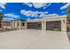 Spacious garage with plenty of room for parking, storage and epoxy flooring providing a clean aesthetic at 6712 E Pershing Ave, Scottsdale, AZ 85254