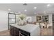 Eat-in kitchen featuring a large island and modern finishes at 6712 E Pershing Ave, Scottsdale, AZ 85254