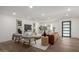 Open concept living room with hardwood floors and neutral decor at 6712 E Pershing Ave, Scottsdale, AZ 85254
