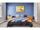 Cozy bedroom featuring a comfortable bed, bedside tables, and stylish wall art at 6850 E Mcdowell Rd # 72, Scottsdale, AZ 85257