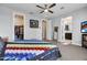 Inviting bedroom with a colorful quilt, walk-in closet, and en-suite bathroom at 6850 E Mcdowell Rd # 72, Scottsdale, AZ 85257