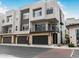 Modern three-story townhome with attached garage and balcony at 6850 E Mcdowell Rd # 72, Scottsdale, AZ 85257