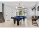 Game room with pool table and access to backyard at 6850 E Mcdowell Rd # 72, Scottsdale, AZ 85257
