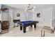 Spacious game room featuring a stylish billiard table, modern lighting, and comfortable seating at 6850 E Mcdowell Rd # 72, Scottsdale, AZ 85257