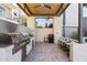 Outdoor grilling area with built-in gas grills and seating at 6850 E Mcdowell Rd # 72, Scottsdale, AZ 85257