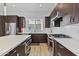 Modern kitchen with stainless steel appliances and an island at 6850 E Mcdowell Rd # 72, Scottsdale, AZ 85257
