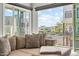 Living room with sliding doors leading to a balcony and city views at 6850 E Mcdowell Rd # 72, Scottsdale, AZ 85257