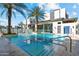 Refreshing community pool and spa area with palm trees at 6850 E Mcdowell Rd # 72, Scottsdale, AZ 85257