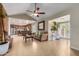 Open living room features a brick fireplace and views into the kitchen at 709 N Williams --, Mesa, AZ 85203