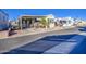 Front view of house with golf cart and street view at 7750 E Broadway Rd # 770, Mesa, AZ 85208