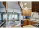 Bright kitchen features wood cabinets, and a dining area at 7750 E Broadway Rd # 770, Mesa, AZ 85208