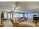 Spacious living room with comfy seating and large windows at 7750 E Broadway Rd # 770, Mesa, AZ 85208