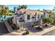 Attractive two-story townhouse with a two-car garage and well-maintained landscaping near a golf course at 8989 N Gainey Center Dr # 222, Scottsdale, AZ 85258
