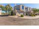 View of townhome's exterior and private driveway at 8989 N Gainey Center Dr # 222, Scottsdale, AZ 85258